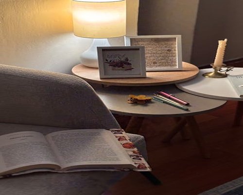 A cozy reading corner with a lamp